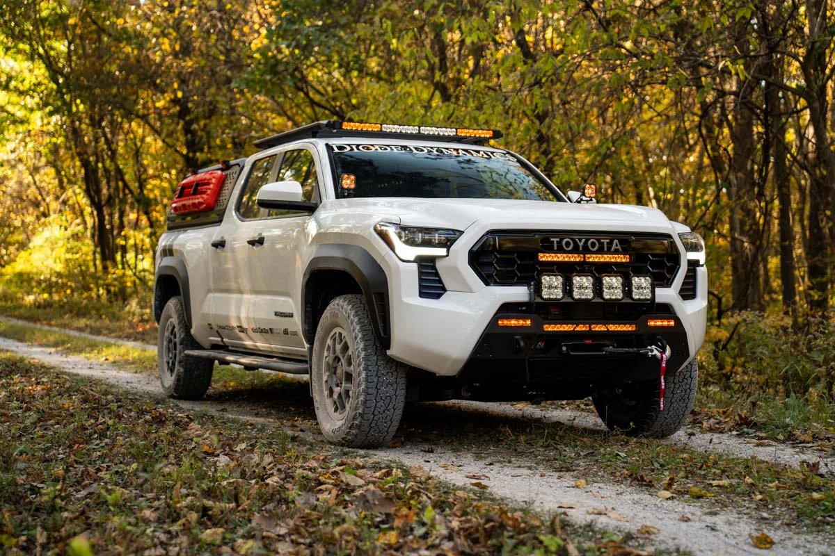 DEK Tacoma 2024 7-Pod SS5 Sport White Driving - Image 5